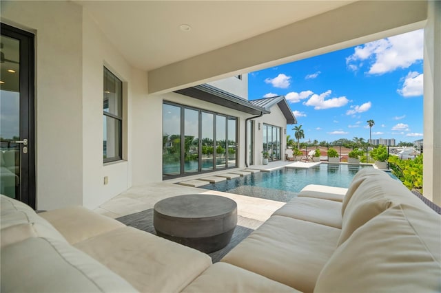 view of swimming pool featuring a patio area and outdoor lounge area