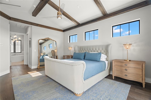 bedroom featuring beamed ceiling, ceiling fan, dark hardwood / wood-style floors, and ensuite bath