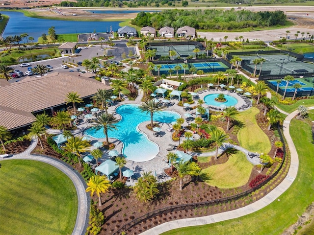 birds eye view of property featuring a water view