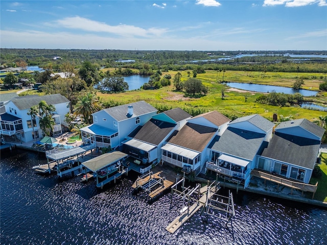 drone / aerial view with a water view