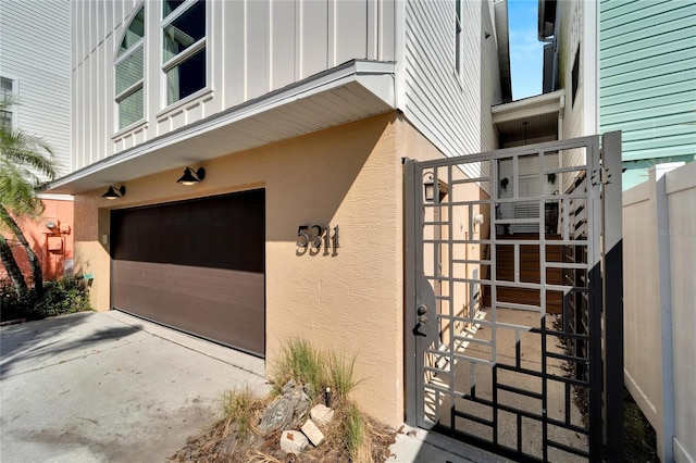 doorway to property featuring a garage