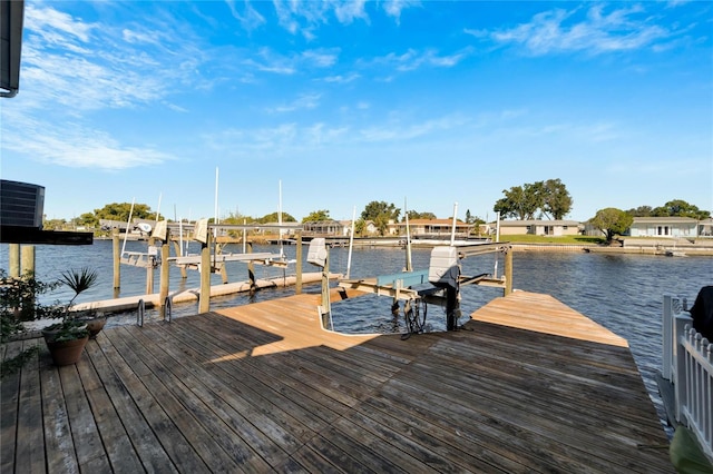 view of dock with a water view