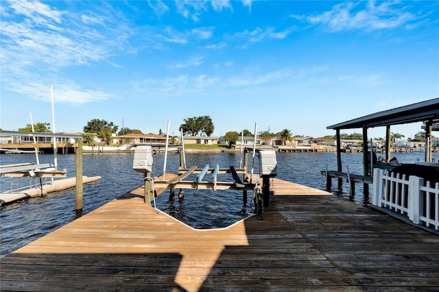 view of dock with a water view