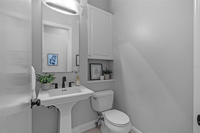 bathroom featuring toilet