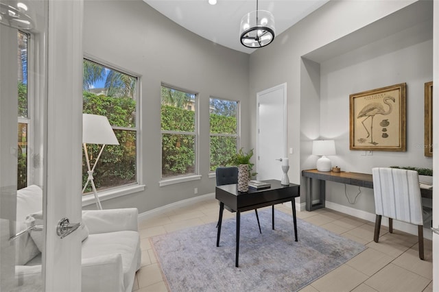 office with a chandelier and light tile patterned floors