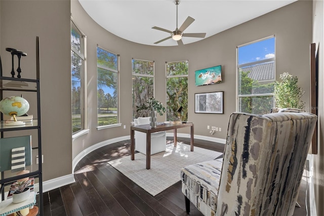 office area featuring dark wood-type flooring and ceiling fan