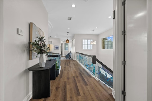 2905 Safe Harbor Dr, Tampa, FL 33618 - corridor featuring wood finished floors, an upstairs landing, baseboards, and recessed lighting