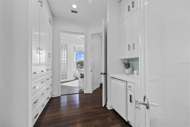 hallway featuring dark hardwood / wood-style floors