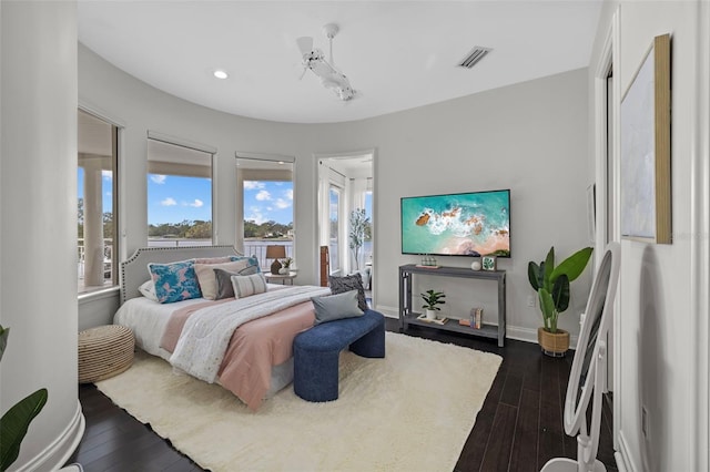 bedroom featuring dark wood-type flooring