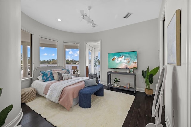 2905 Safe Harbor Dr, Tampa, FL 33618 - bedroom with dark wood-style floors, recessed lighting, and baseboards
