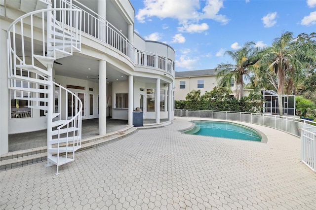 view of swimming pool with a patio