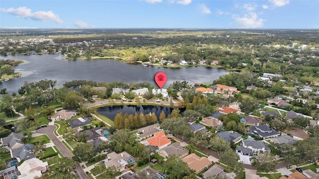 bird's eye view with a water view