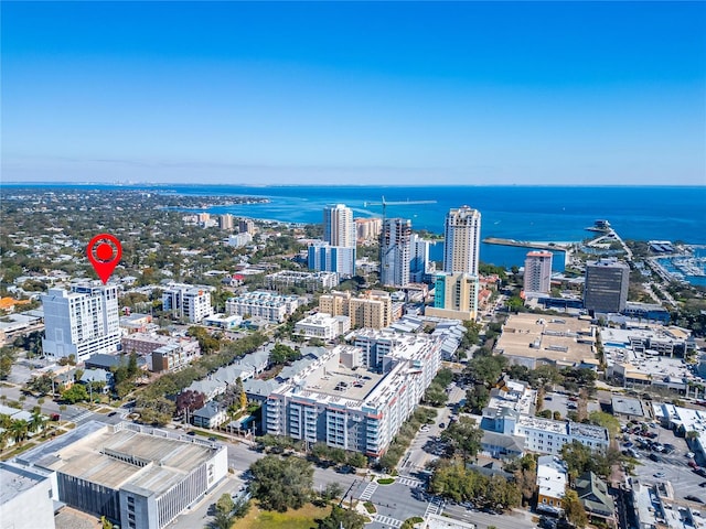 drone / aerial view with a water view