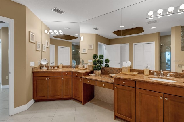 bathroom with vanity, tile patterned floors, and an enclosed shower