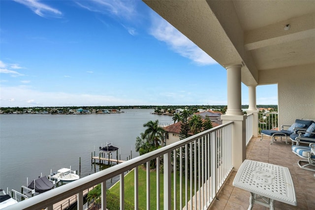 balcony featuring a water view