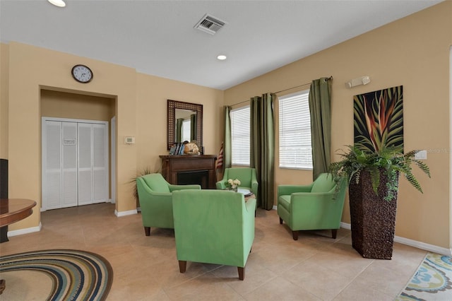 living room with light tile patterned floors