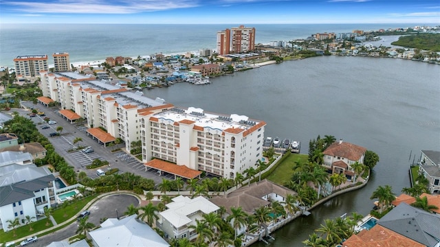 birds eye view of property featuring a water view