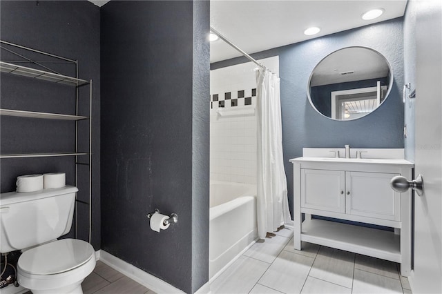 full bathroom with toilet, shower / bath combo with shower curtain, vanity, and tile patterned flooring