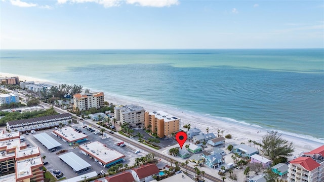 drone / aerial view with a beach view and a water view