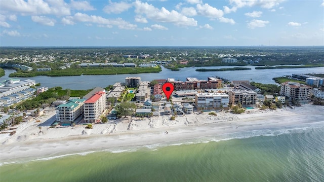 bird's eye view featuring a view of the beach and a water view