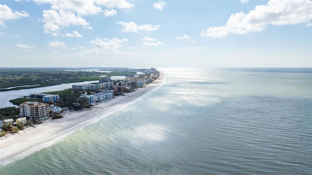 aerial view with a water view and a beach view