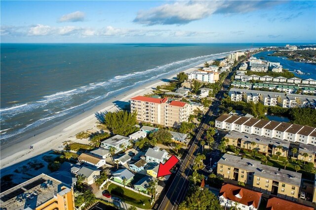 drone / aerial view with a water view and a view of the beach