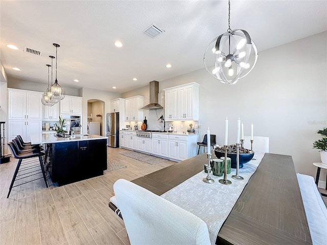 dining room with light hardwood / wood-style floors