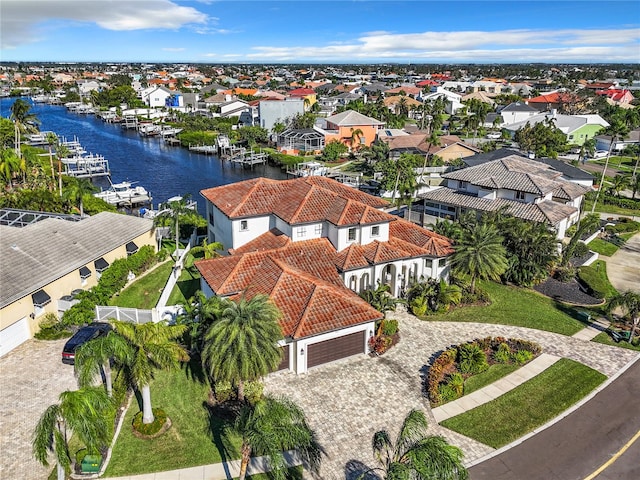 bird's eye view with a water view