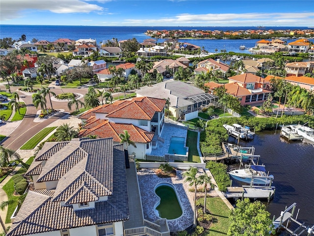 drone / aerial view with a water view