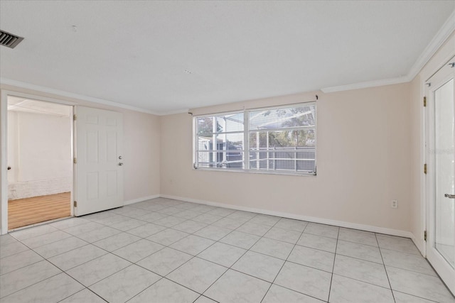 unfurnished bedroom featuring ornamental molding and light tile patterned flooring