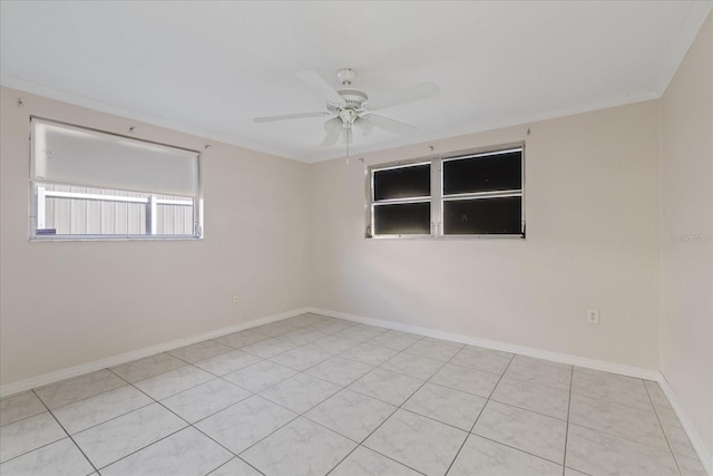 unfurnished room with crown molding, light tile patterned floors, and ceiling fan