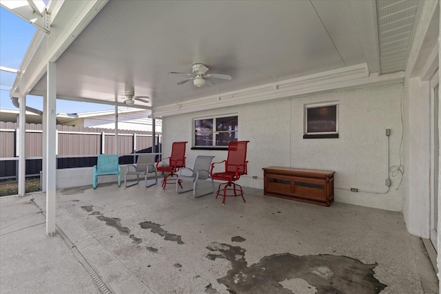 view of patio featuring ceiling fan