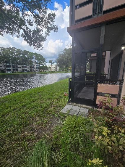 view of yard featuring a water view