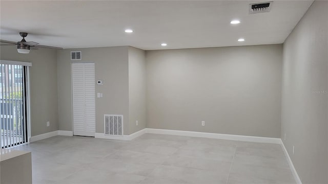 spare room featuring ceiling fan