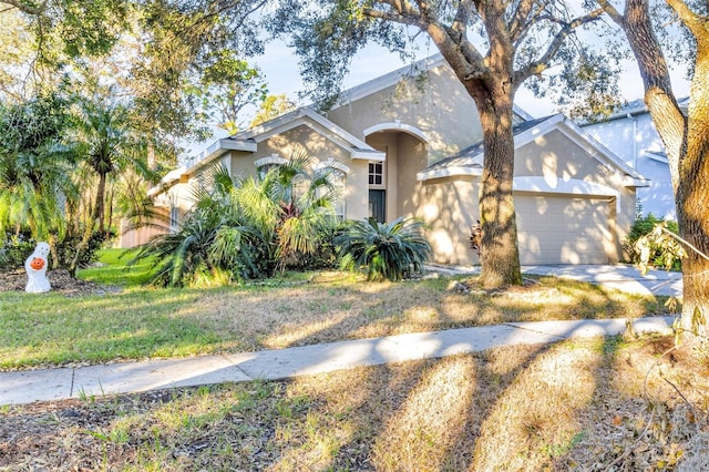 view of front of home with a garage