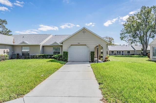 single story home with a front yard, a garage, and cooling unit