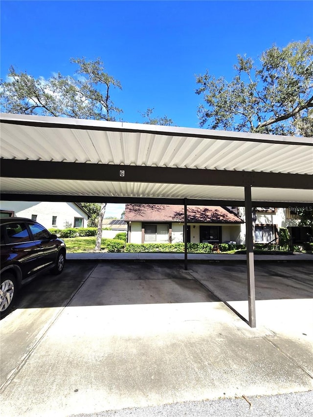 view of car parking with a carport