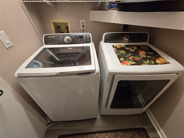 laundry room featuring washing machine and dryer