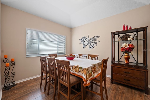 dining room with dark wood-type flooring