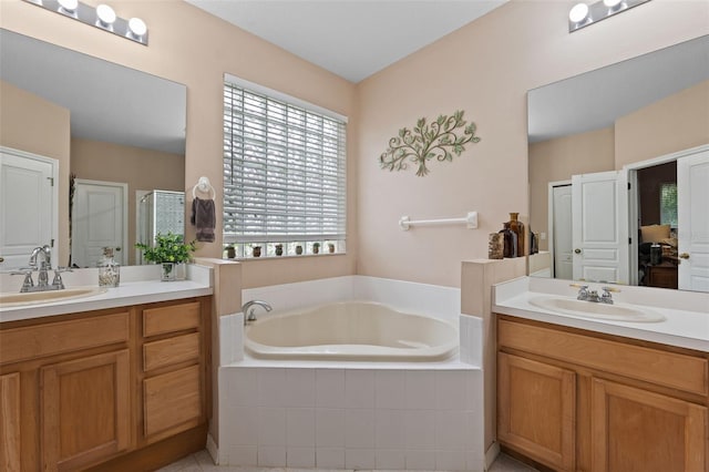 bathroom with vanity, plus walk in shower, and tile patterned flooring