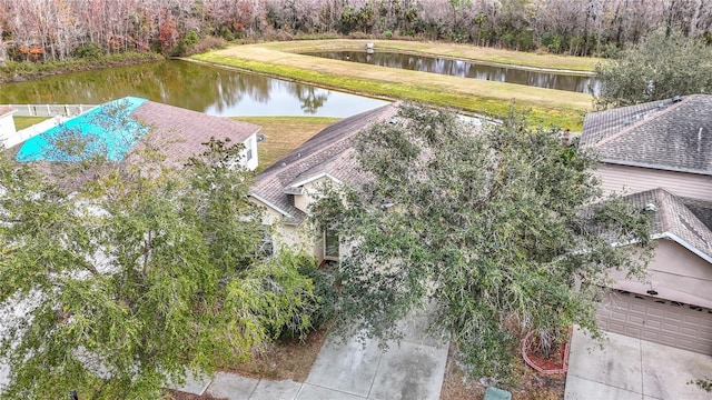 bird's eye view with a water view