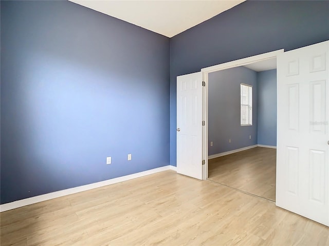 unfurnished bedroom featuring light hardwood / wood-style floors