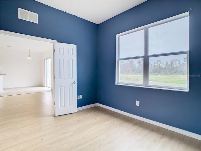 empty room featuring light wood-type flooring