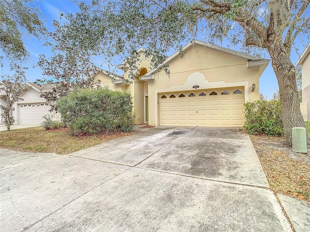 single story home featuring a garage