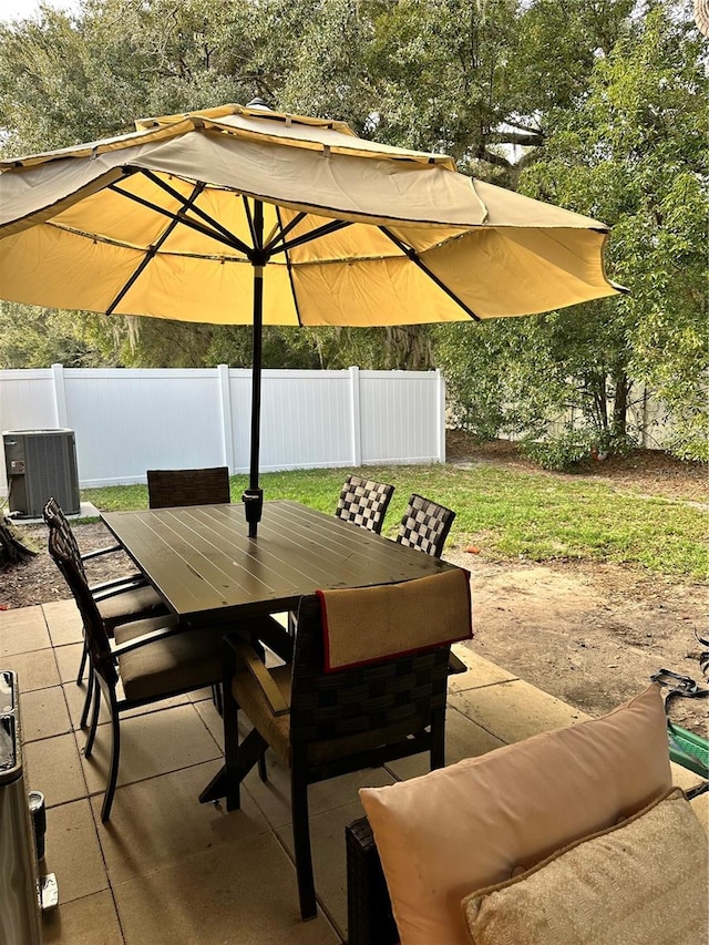 view of patio featuring cooling unit