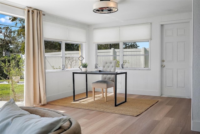 office space with hardwood / wood-style floors