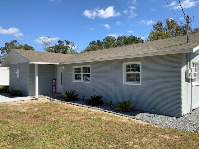 ranch-style house with a front yard