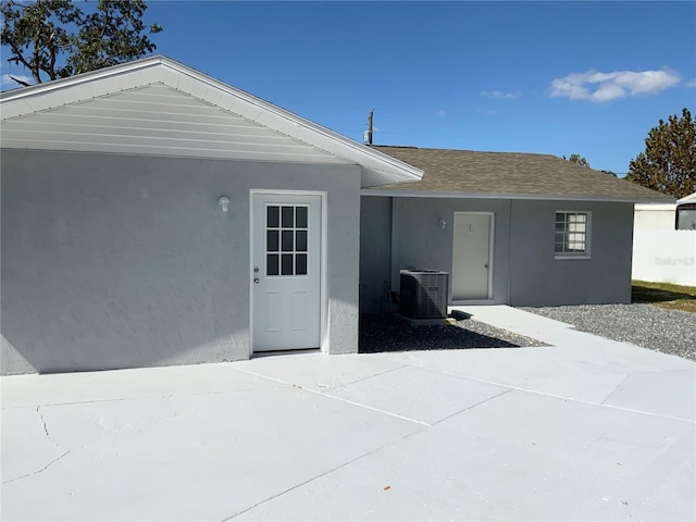 exterior space featuring a patio area and central AC unit