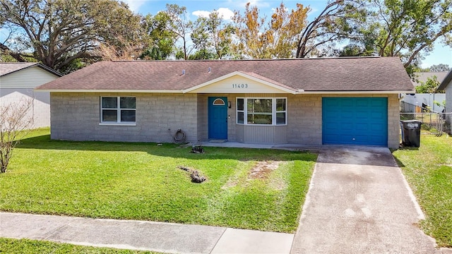 ranch-style house with a front lawn and a garage