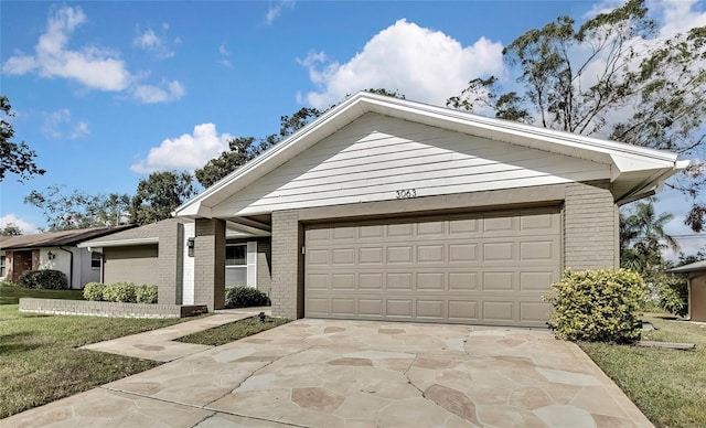 ranch-style home with a garage